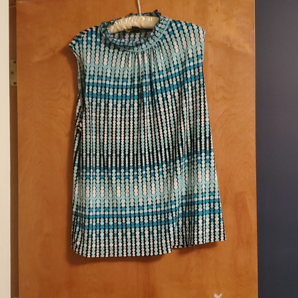 Turtleneck sleeveless blouse